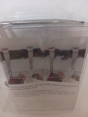 NWT 4 Piece Silver Tone Stocking Holders